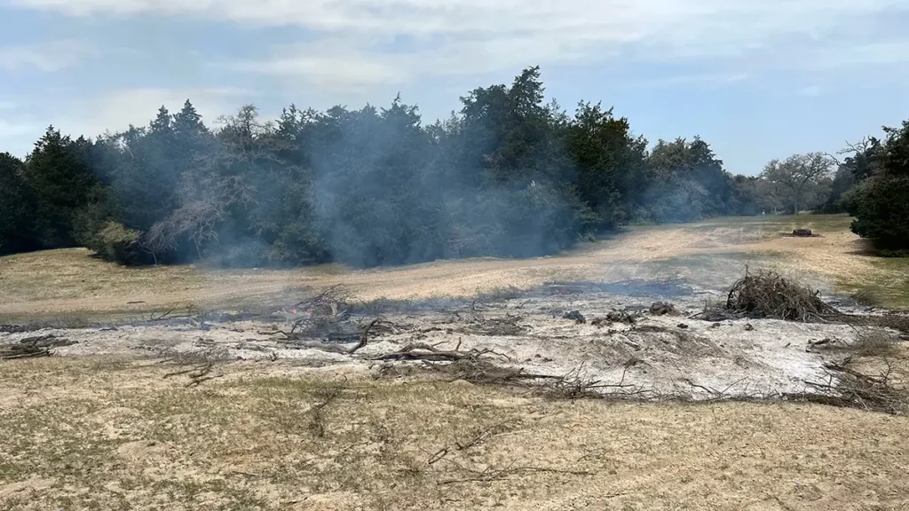 Land clearing project preparing acreage for new home construction