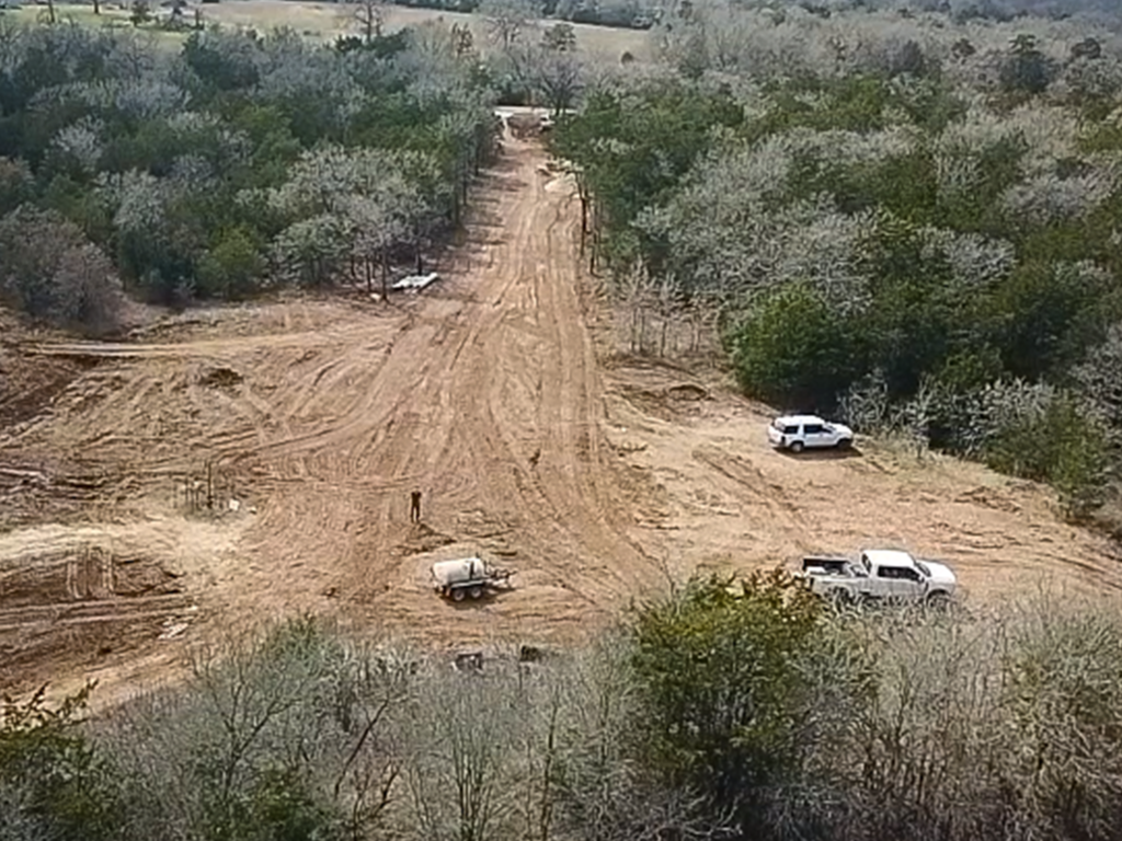Forestry mulching clearing cedar trees on rural property in Lexington Texas